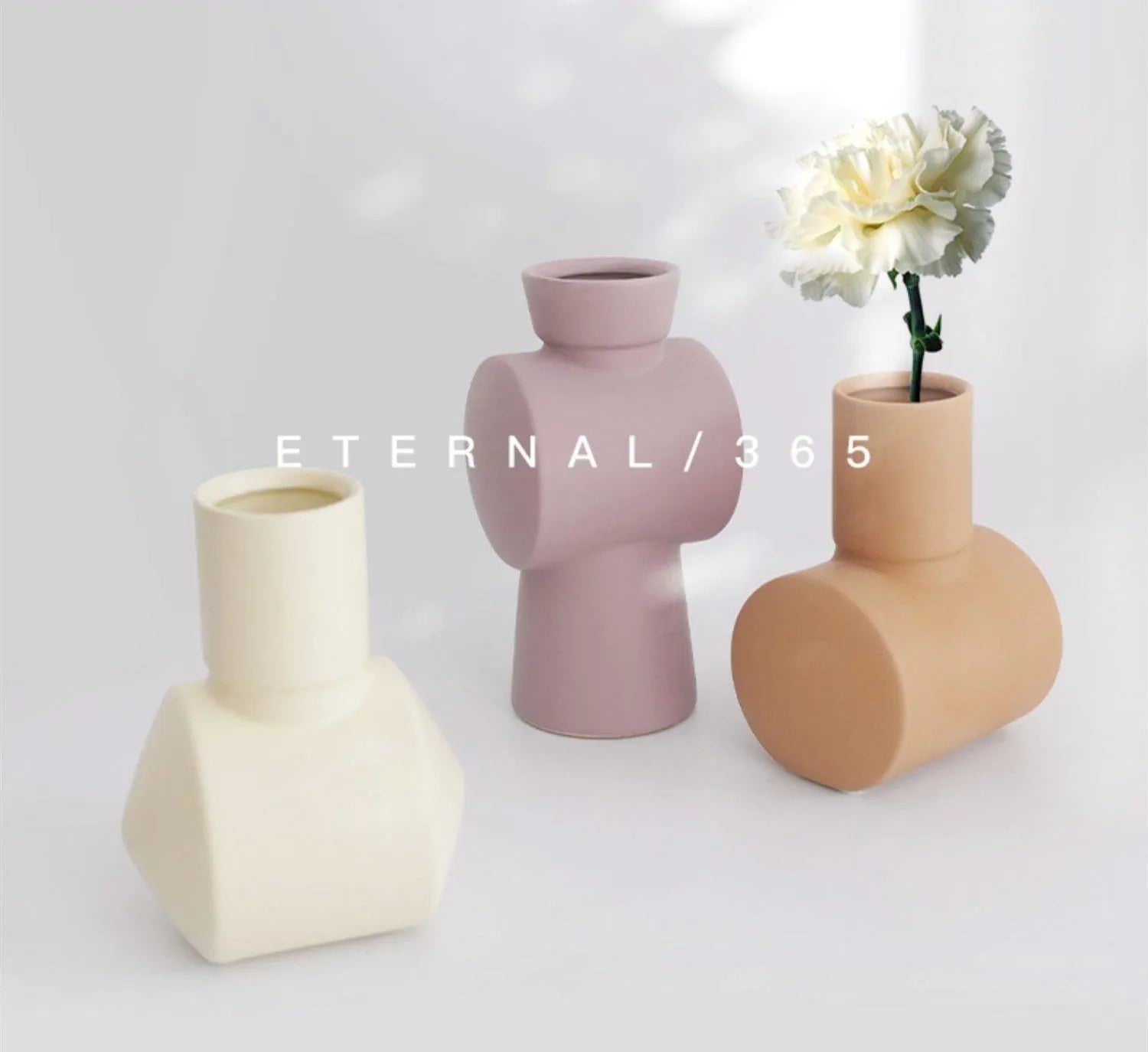 Nordic style ceramic vase with hammer texture and Morandi colour glaze in beige, brown, or purple.