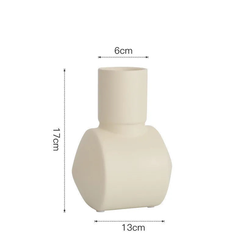 Nordic style ceramic vase with hammer texture and Morandi colour glaze in beige, brown, or purple.