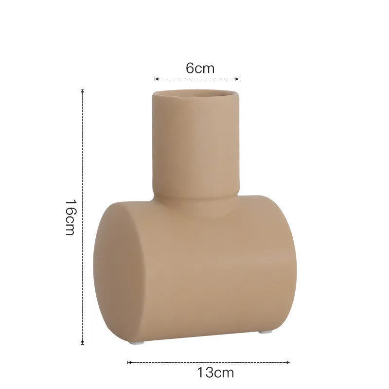 Nordic style ceramic vase with hammer texture and Morandi colour glaze in beige, brown, or purple.