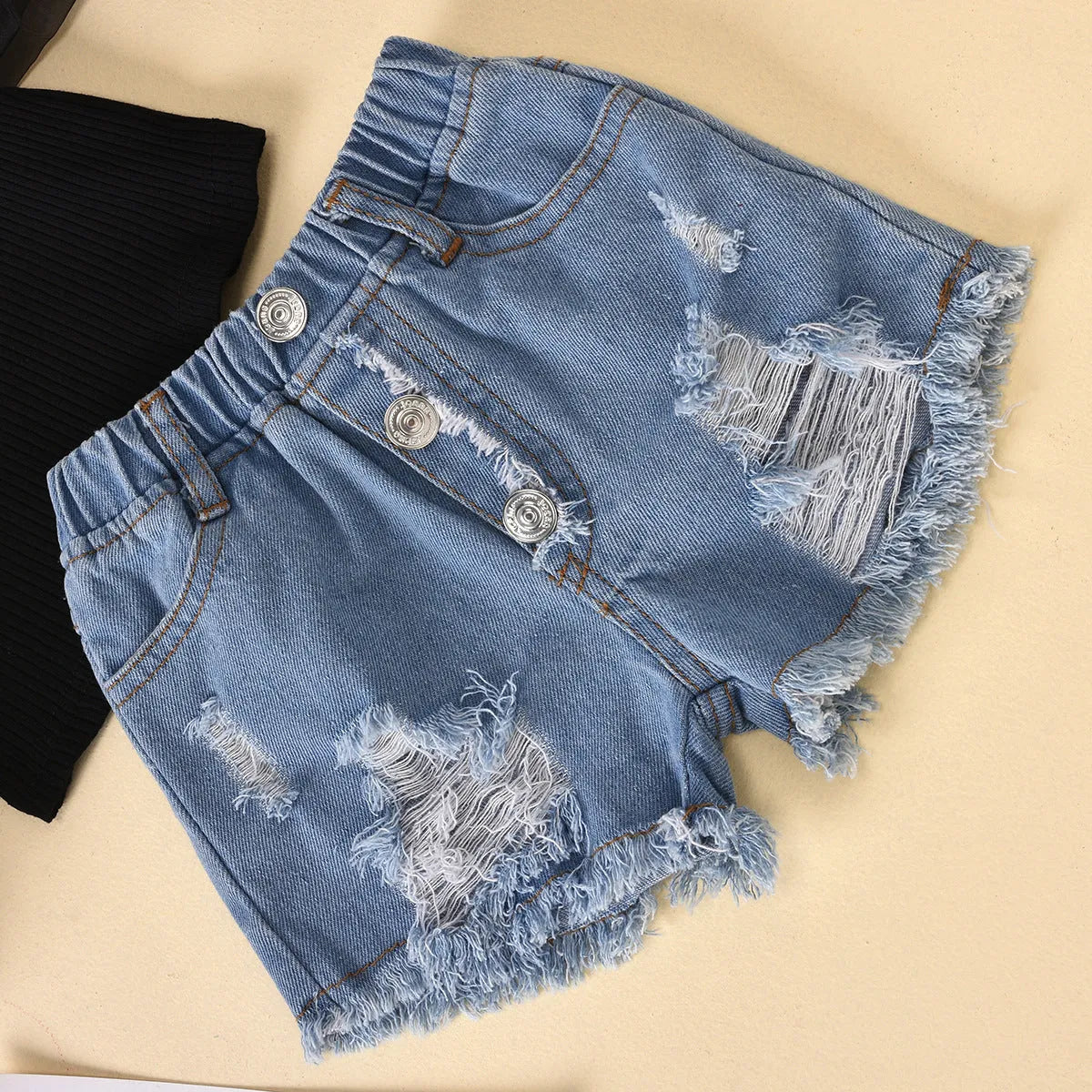 Children's black striped top with mesh sleeves and ripped denim shorts two-piece suit