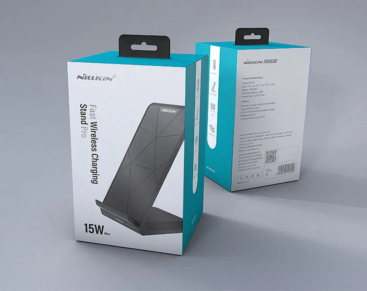 Vertical Pro Fast Wireless Charger in black, standing upright on a desk with a phone placed against the vertical pad.