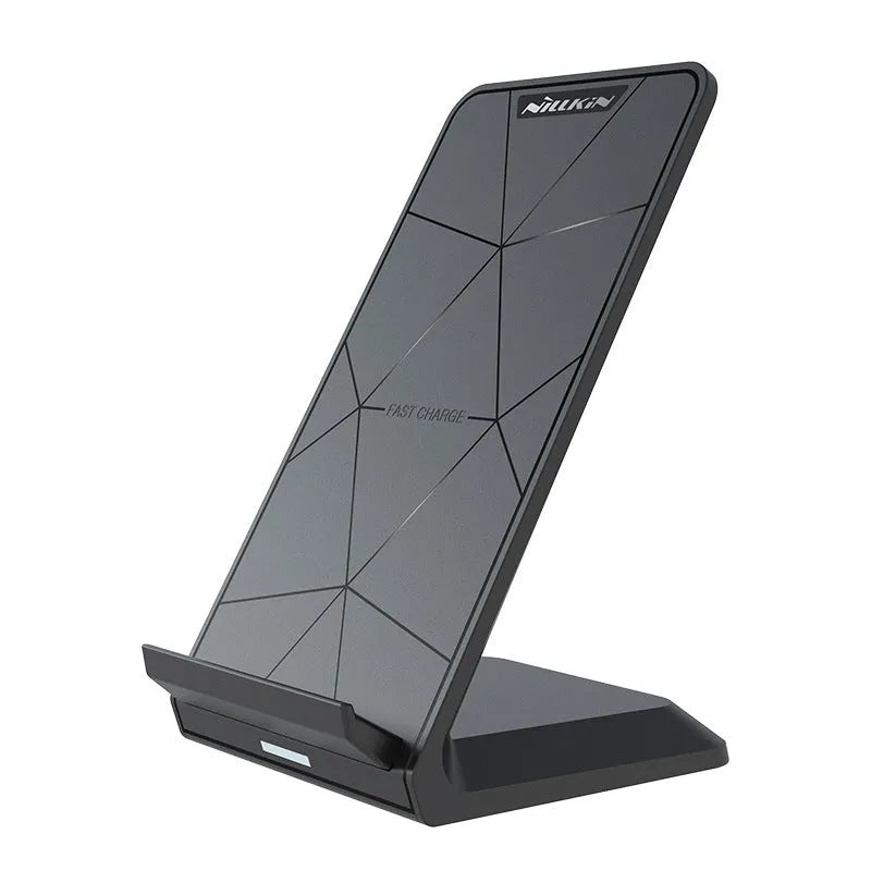 Vertical Pro Fast Wireless Charger in black, standing upright on a desk with a phone placed against the vertical pad.