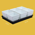 Meishi black and white resin succulent flower pots arranged on a matching drainage tray.