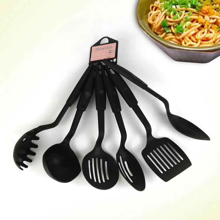 Black rubber kitchen utensil set with shovel spoon for non-stick pans