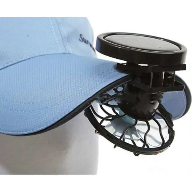 Small black solar-powered clip-on cooling fan with solar panel, suitable for outdoor travel and camping.