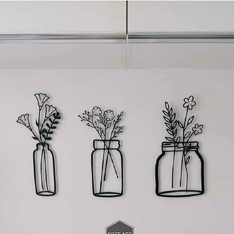Black iron flower silhouette wall decoration with 40cm height on a white wall