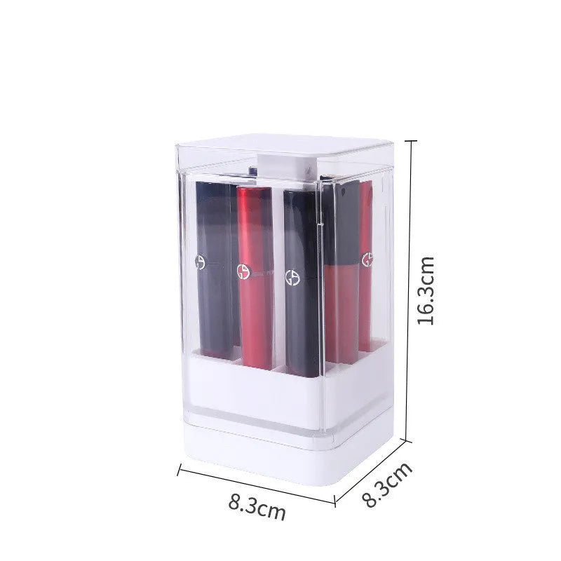 Pink press-lift lipstick storage box with dust cover open, showing 12 individual compartments.