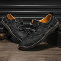 Men's black microfiber casual leather shoes with round toe on size display