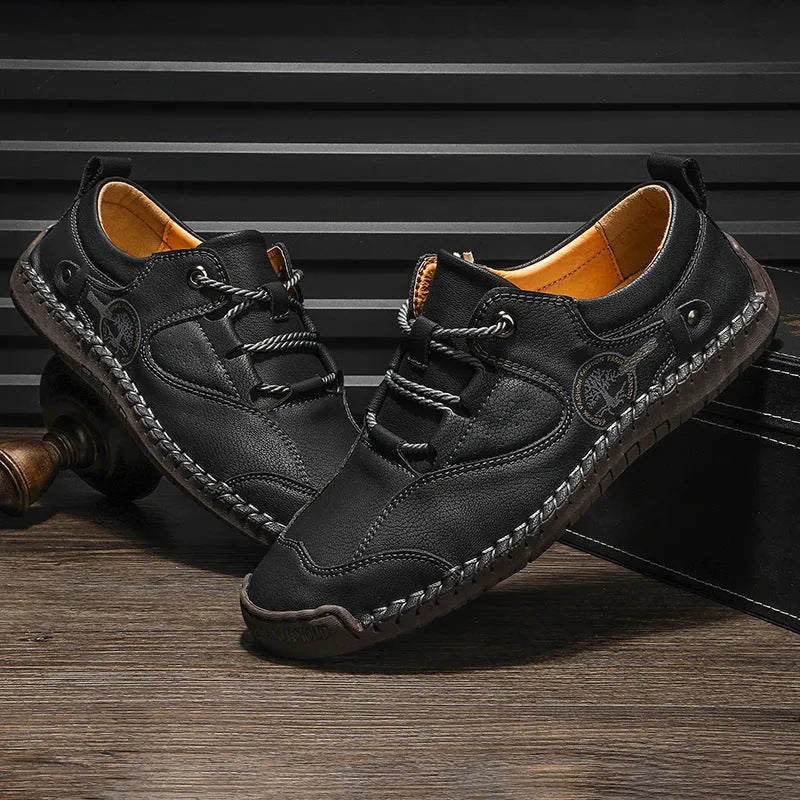 Men's black microfiber casual leather shoes with round toe on size display