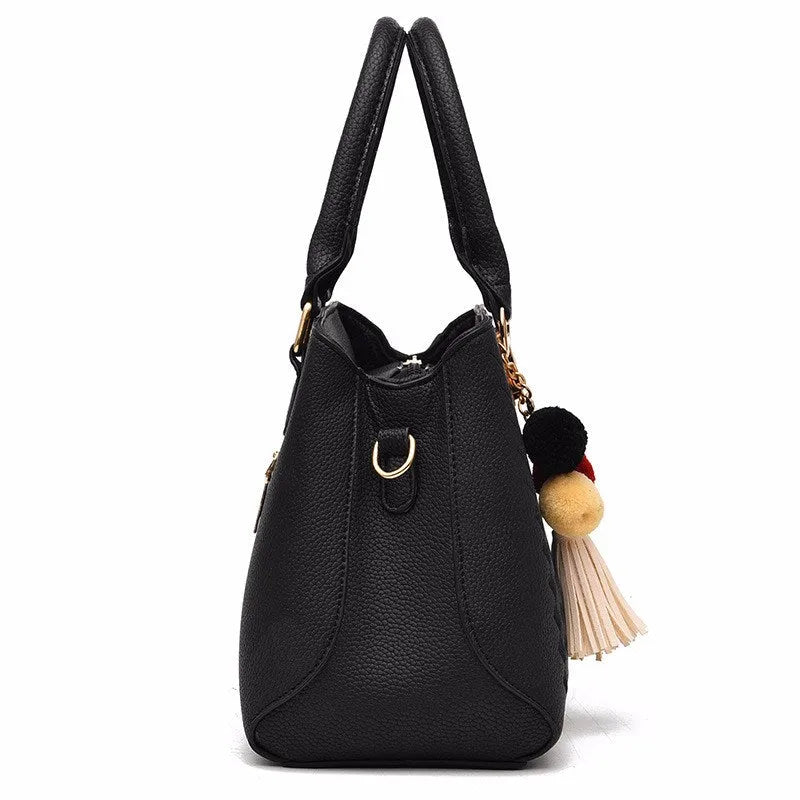 Ladies handbag in PU leather with zipper closure, available in multiple colours, shown as a crossbody style with internal compartments
