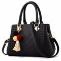 Ladies handbag in PU leather with zipper closure, available in multiple colours, shown as a crossbody style with internal compartments