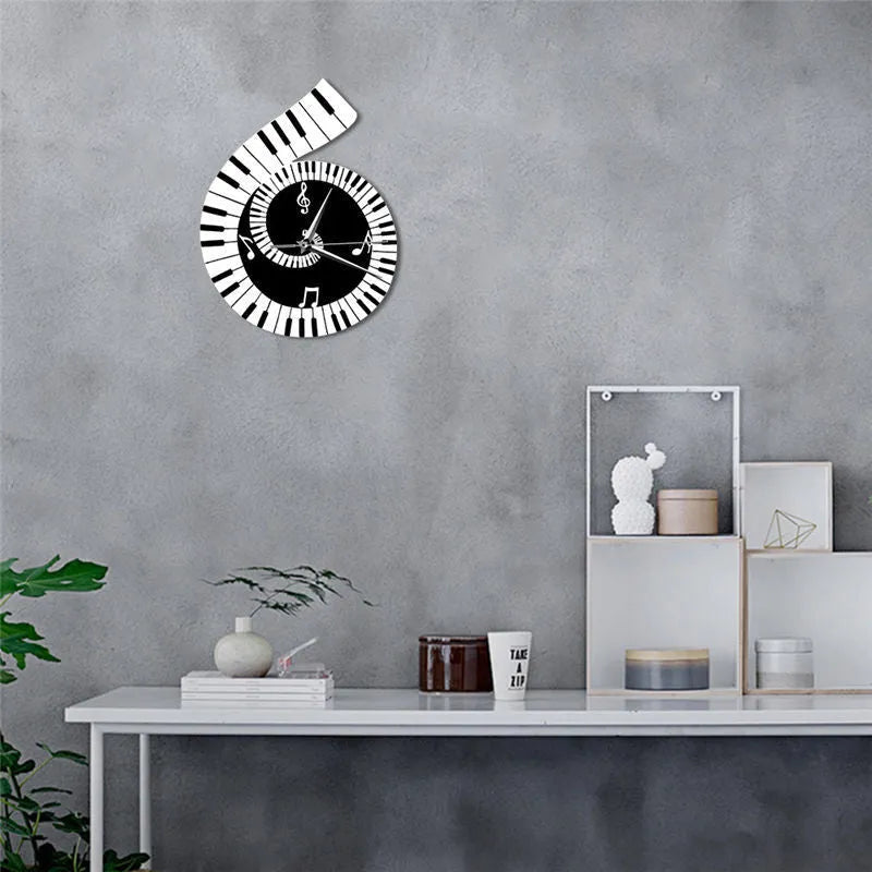Irregular shaped black and white wall clock with treble clef, piano keyboard, and musical note decoration.