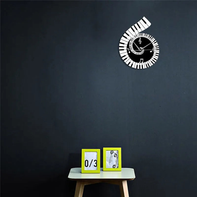 Irregular shaped black and white wall clock with treble clef, piano keyboard, and musical note decoration.