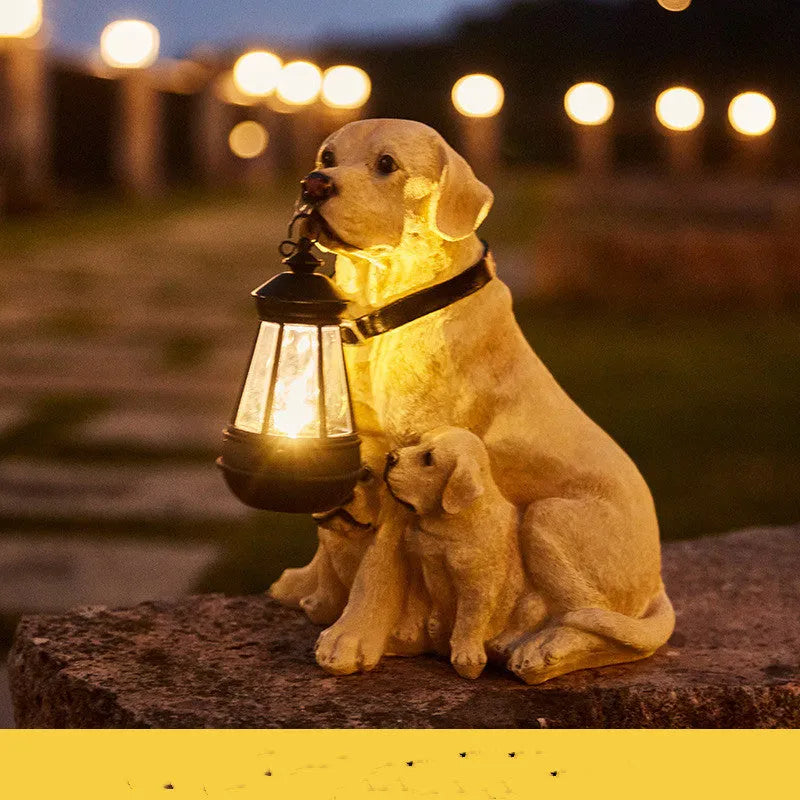 LED solar light dog lantern sculpture in Golden Retriever style on a garden lawn, resin craft with warm glow at night