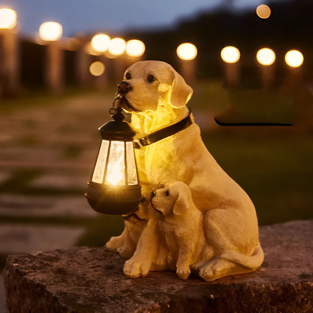 LED solar light dog lantern sculpture in Golden Retriever style on a garden lawn, resin craft with warm glow at night
