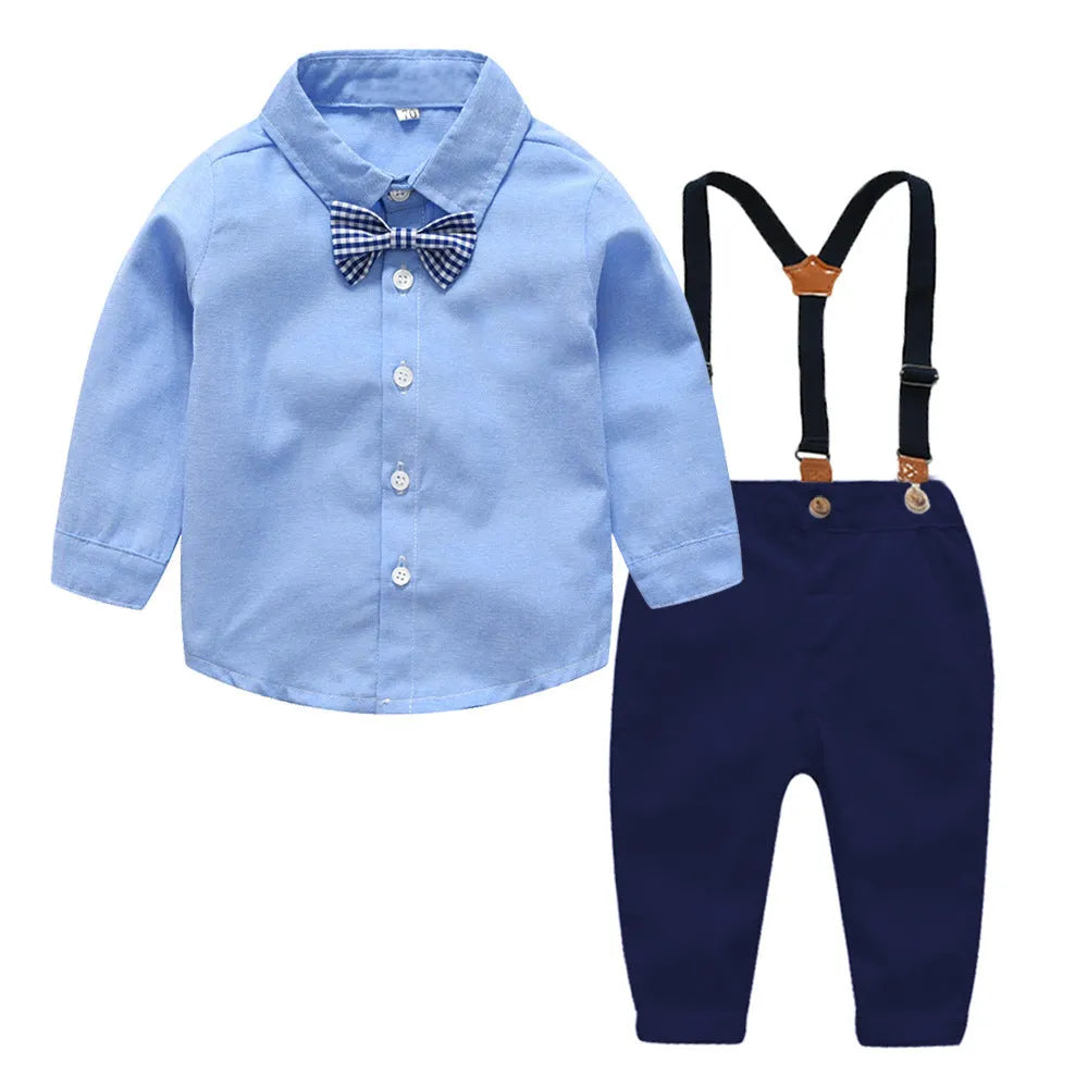 A boy's blue or white gentleman bib pant suit with long sleeves, trousers, and a matching bow tie.