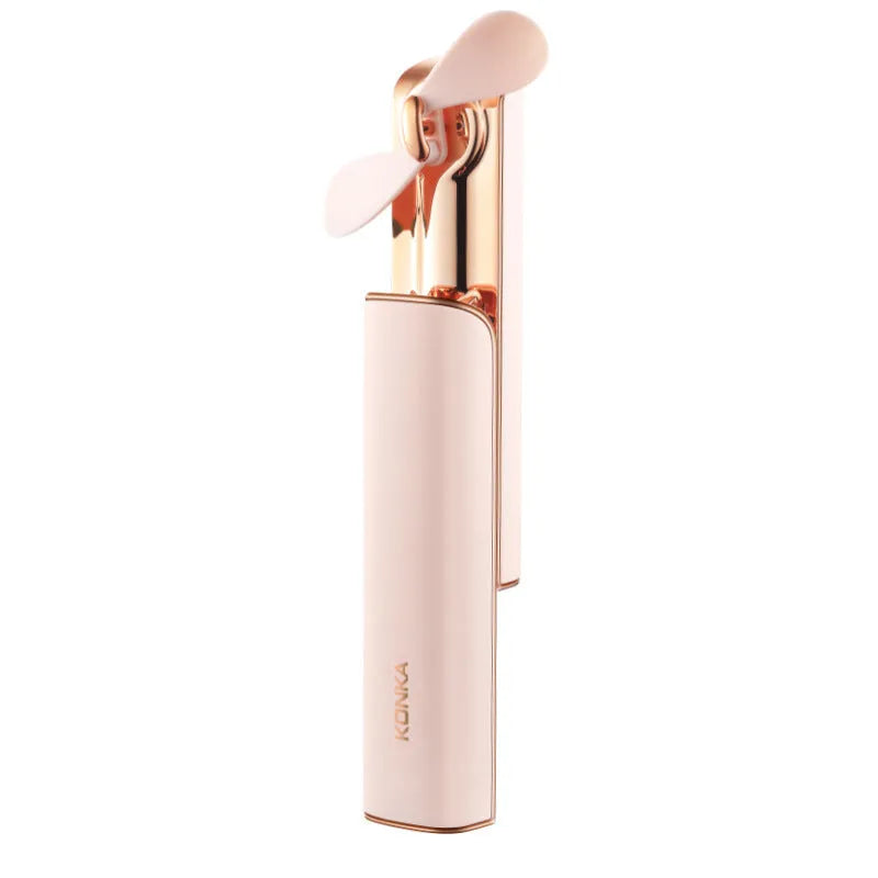 Pink mini handheld folding fan with USB charging port and two-speed mechanical controls