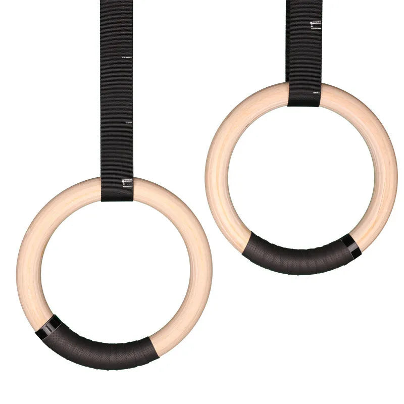 Birch gymnastics rings with 4.5m nylon strap, available in 28mm and 32mm wooden ring options
