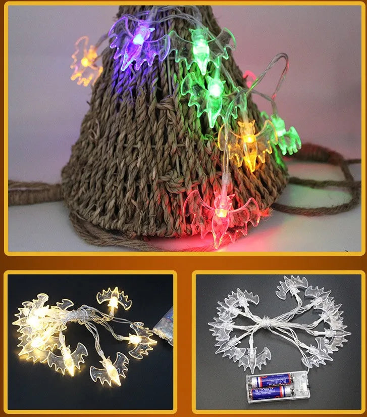 Halloween LED string lights with plastic pumpkin, ghost and bat decorations hanging on a 1.2 metre cable.