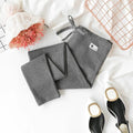 Pregnancy leggings with abdomen support, cotton blend fabric, in black, dark grey, and light grey colours