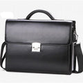 Black horizontal PU leather men's business briefcase with a zipper opening and single carry handle.