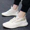 Men's white low-top sports shoes with mesh upper and rubber sole on a plain background.