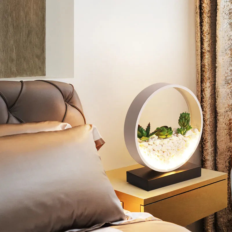 Black table lamp with metal lamp holder and push-button switch for bedside lighting
