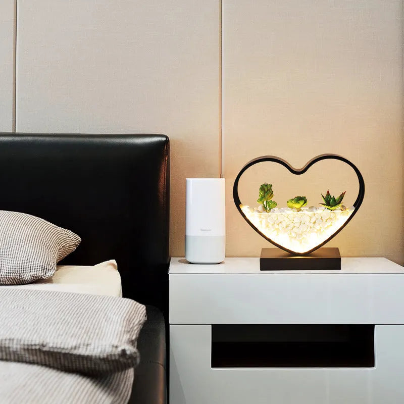Black table lamp with metal lamp holder and push-button switch for bedside lighting