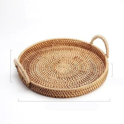 Round handwoven rattan storage basket with a wooden handle in a natural colour.