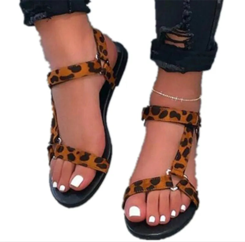 Flat women beach sandals with Velcro closure in leopard pattern