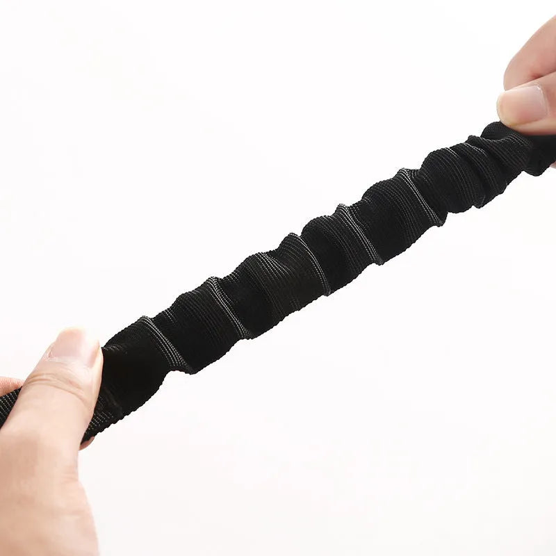 Black retractable nylon pet safety rope with metal buckle for vehicle use, 53-74cm length