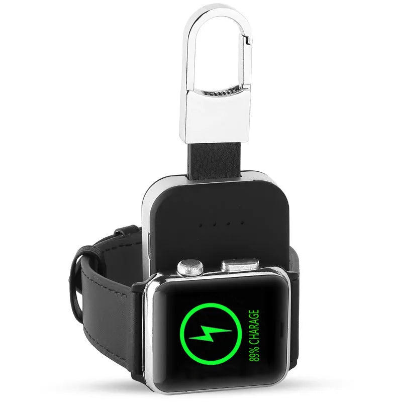 Black portable keychain power bank for wireless charging of an Apple Watch.