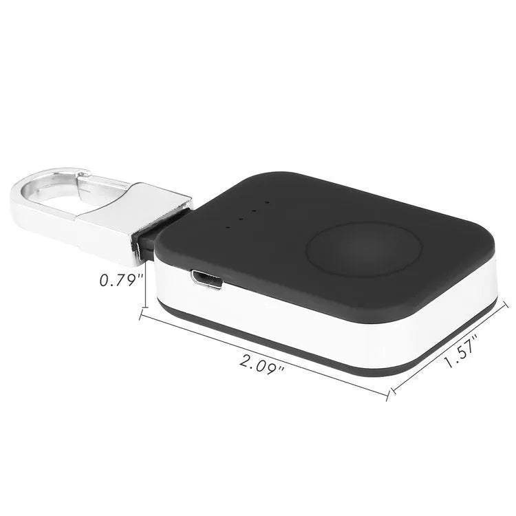 Black portable keychain power bank for wireless charging of an Apple Watch.