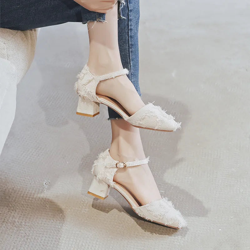 Women's apricot suede d'Orsay flats with an ankle strap and a low block heel.