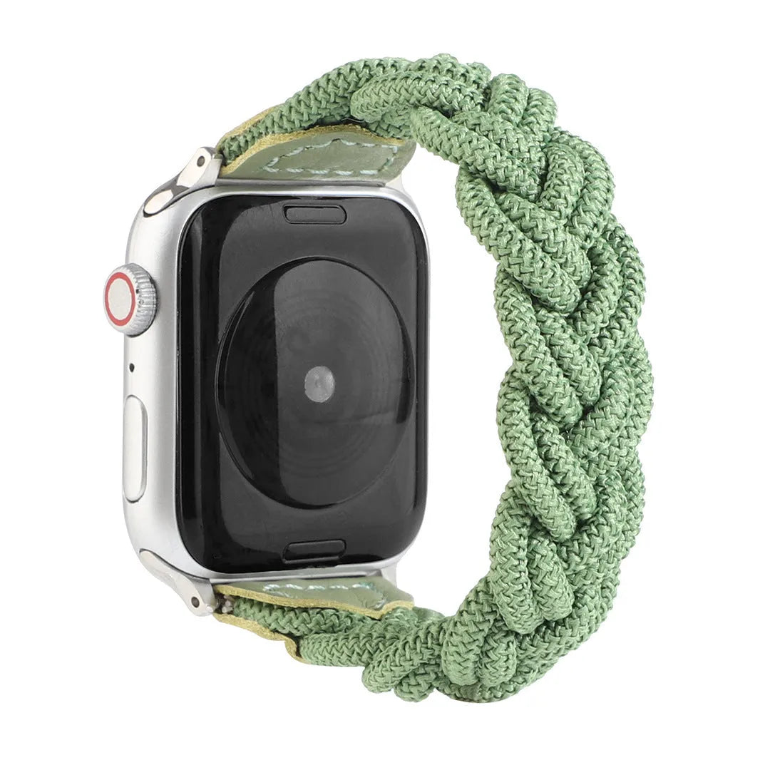 Braided solo loop watch strap for Apple Watch on a wrist, shown in army green colour.