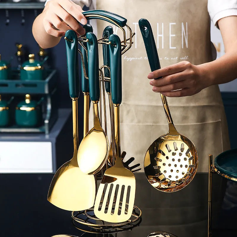 Seven-piece stainless steel kitchen utensil set with slotted spatula, turner, ladle, serving spoon and pasta server