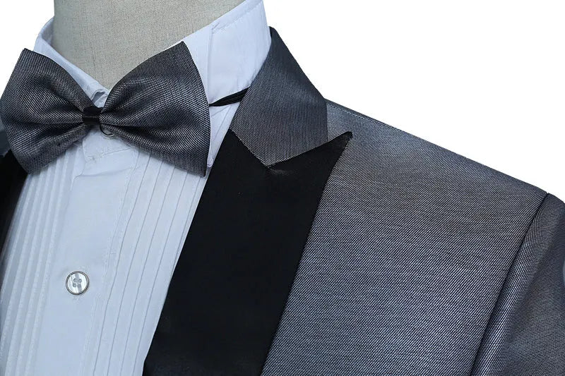 Male dress wedding suit set in black with single-breasted cut collar jacket, trousers, and bow tie