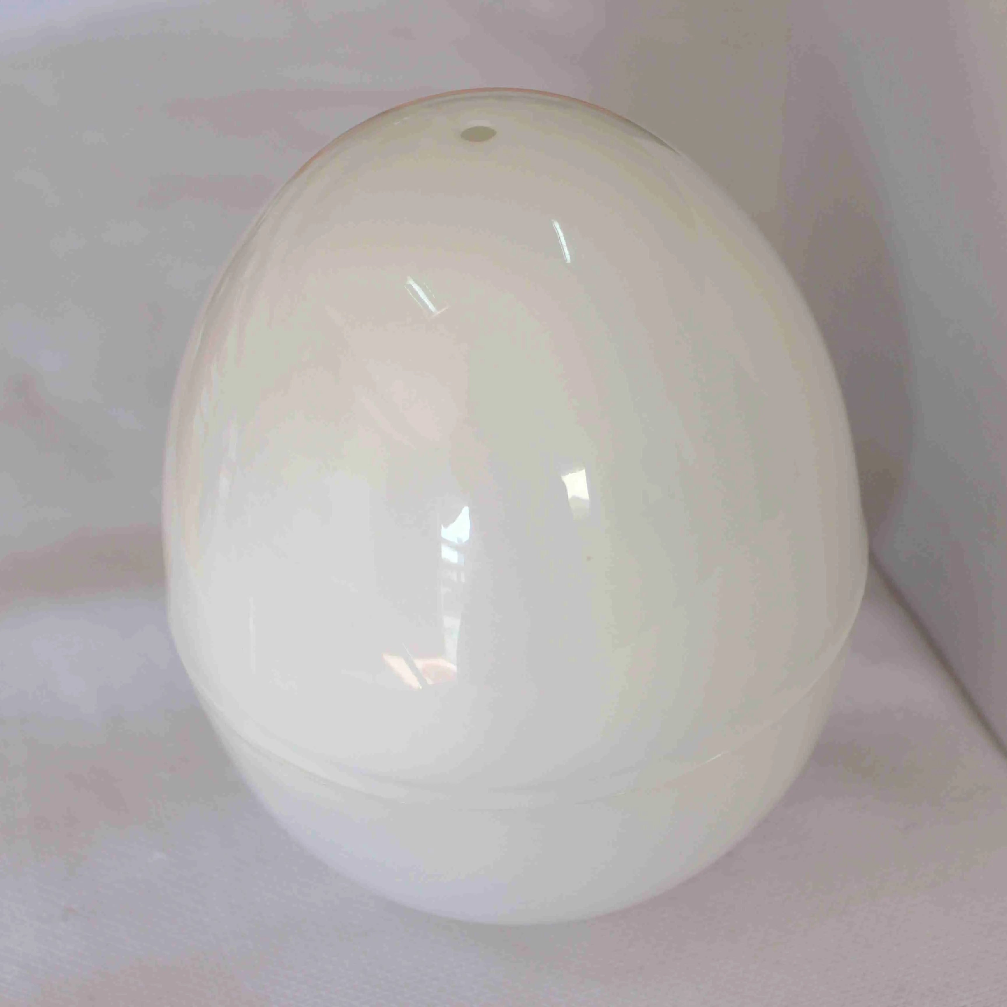 White microwave egg cooker for boiling up to 4 eggs with adjustable cooking settings