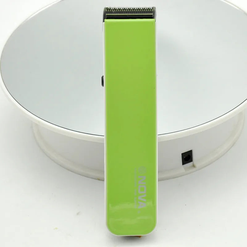 Electric hair clipper with removable blade head in black, blue, orange, red, or white colour options
