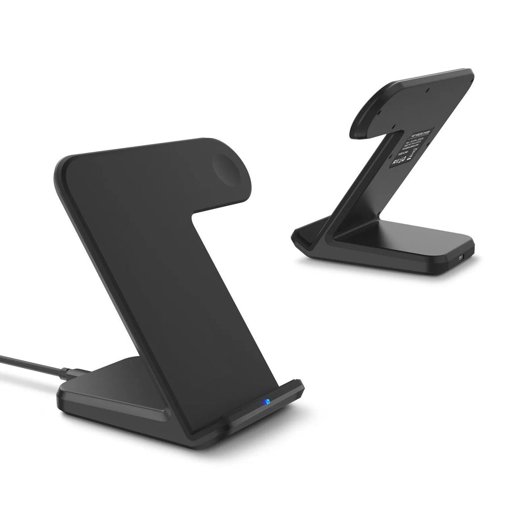 Black or white Qi wireless charging pad for mobile phones on a desk.