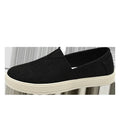 Men's beige canvas slip-on loafers with a round toe and shallow cut on a plain background.