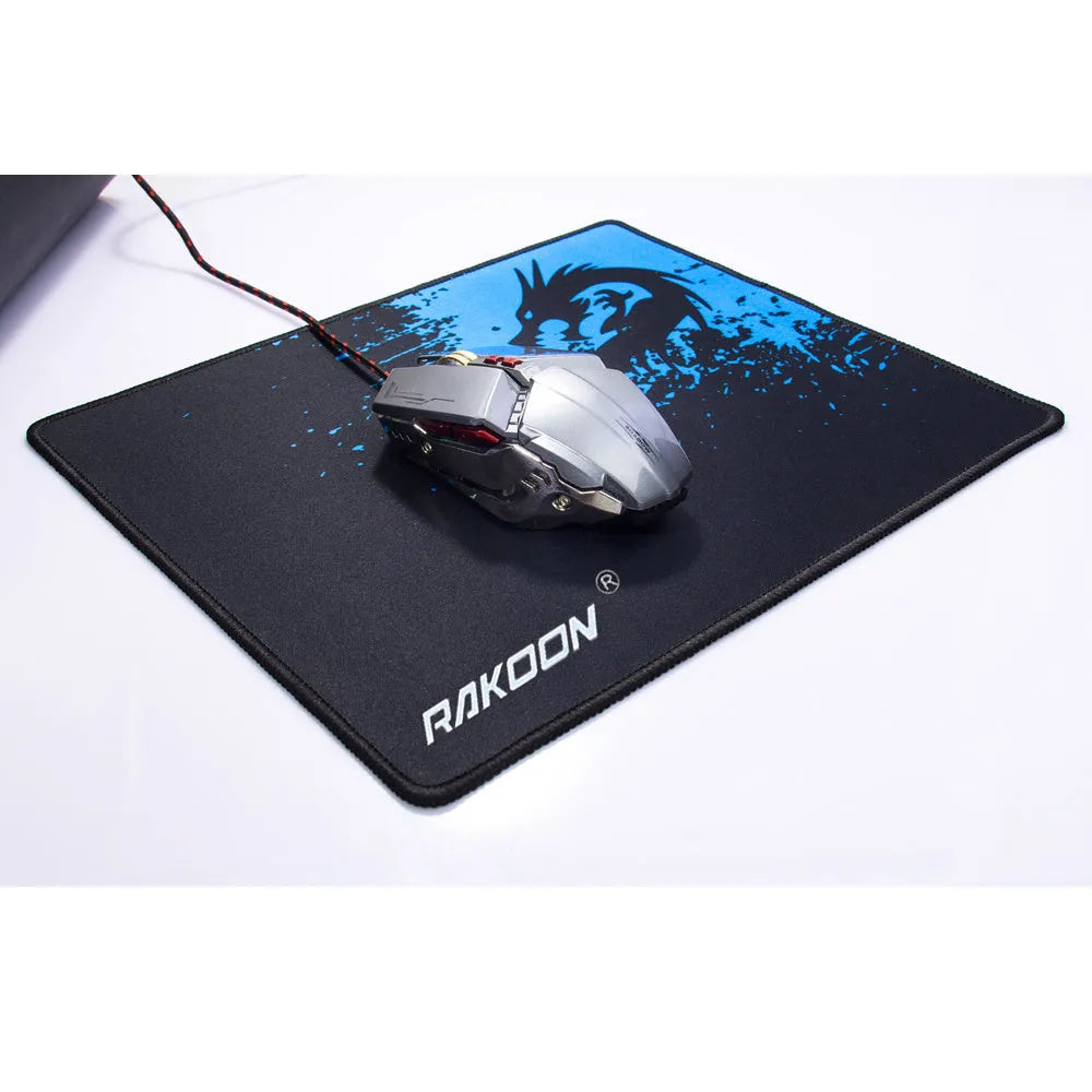 Non-slip mouse pad with textured surface and reinforced stitched edges on a desk