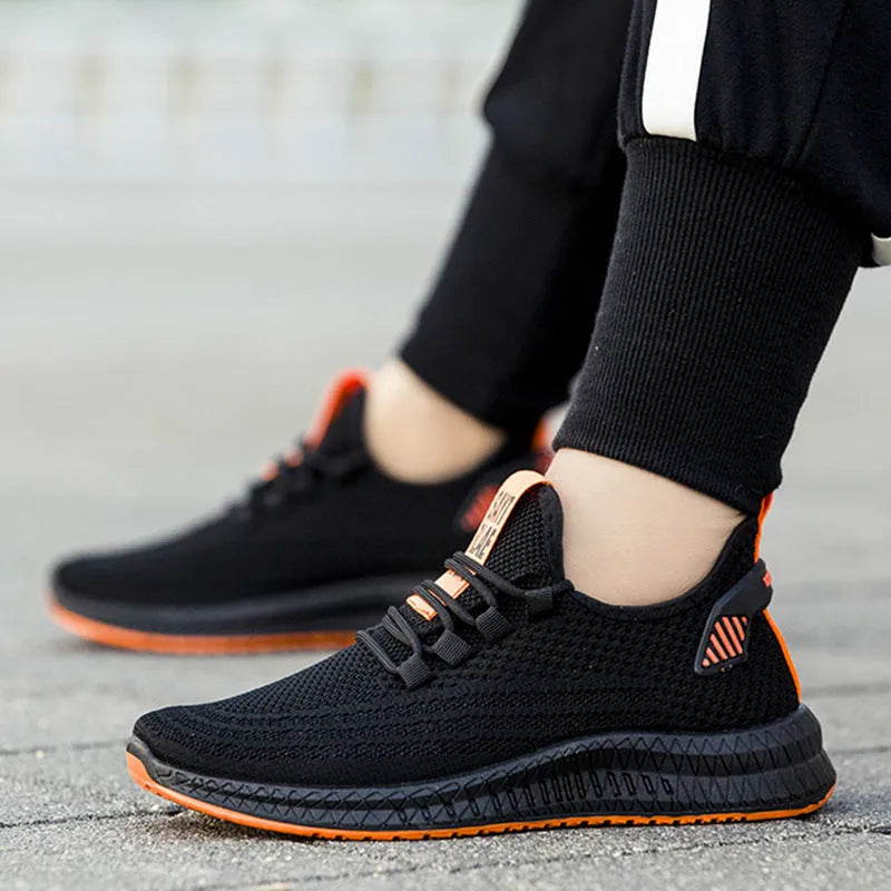 Men's flying woven sneakers with plastic sole, flat heel, round toe, in orange, white or yellow, sizes 39-44