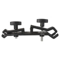 Black ABS plastic umbrella clip for attaching a brolly to a camera tripod.