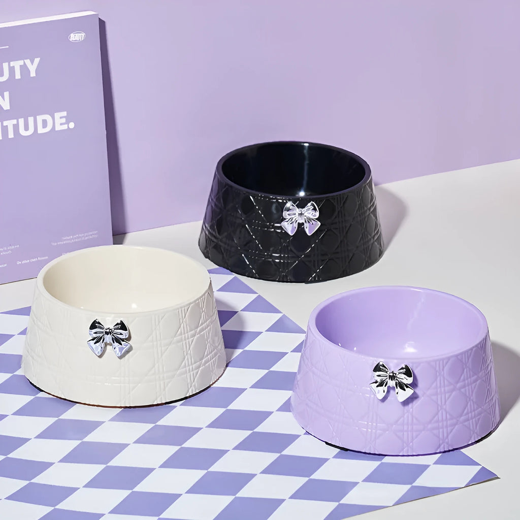 Ceramic pet bowl with diamond pattern and bow design in multiple colour options