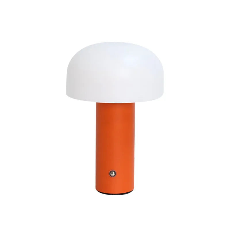 USB-powered plastic table lamp in choice of black, green, orange, or white colours.