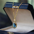Gold colour geometric pendant on a chain, French retro necklace design