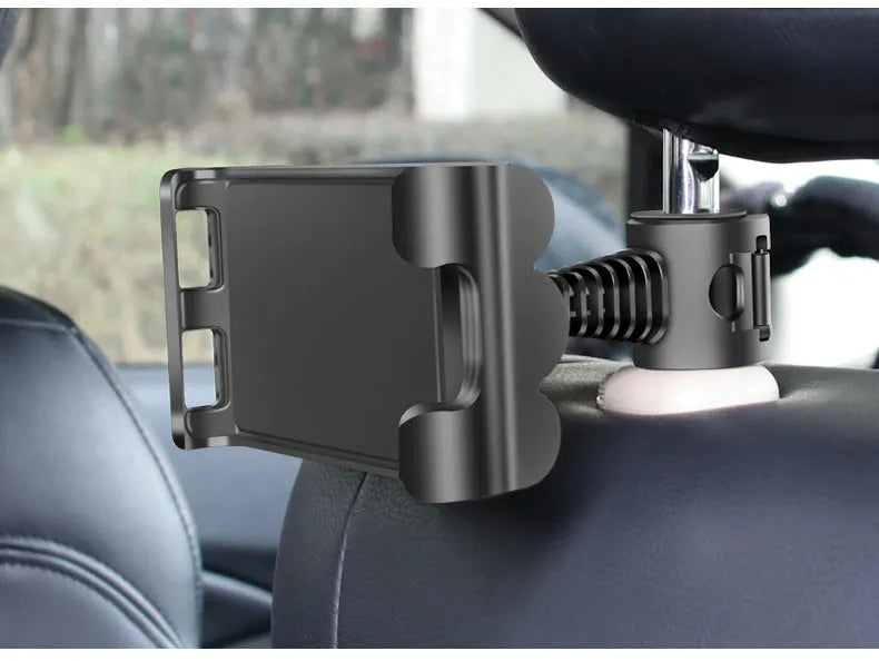 Car headrest tablet holder with extendable arm mounted on vehicle seat