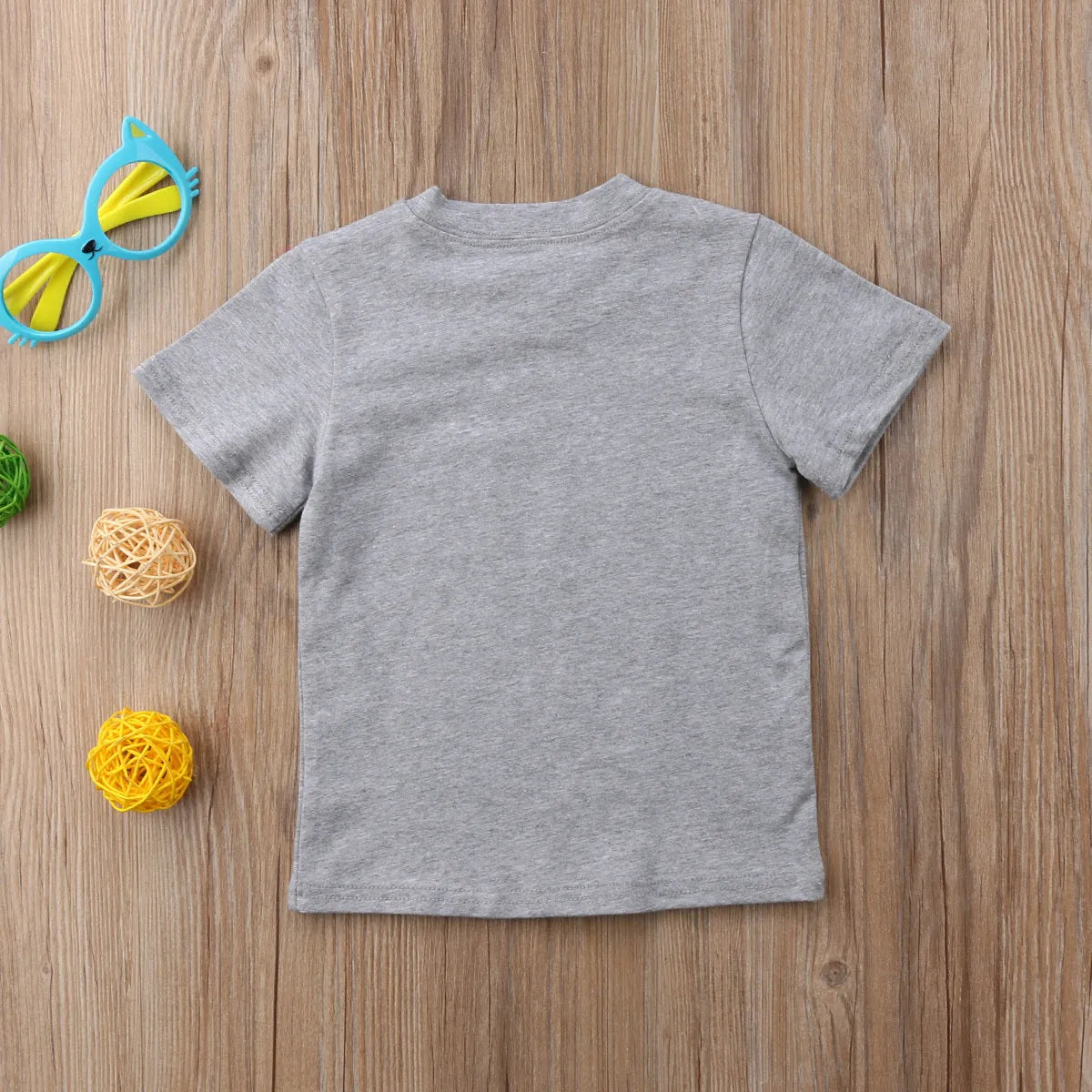 Grey kids cotton t-shirt with printed brother sister designs showing size range from 60cm to 140cm