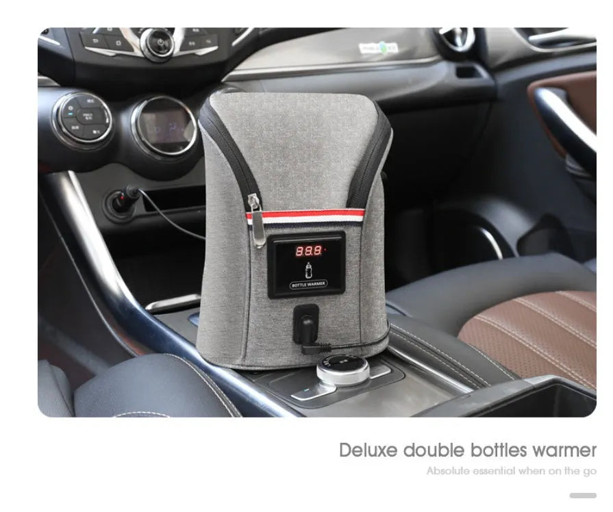 Grey Oxford cloth portable car USB baby bottle warmer with electronic display and car charger.